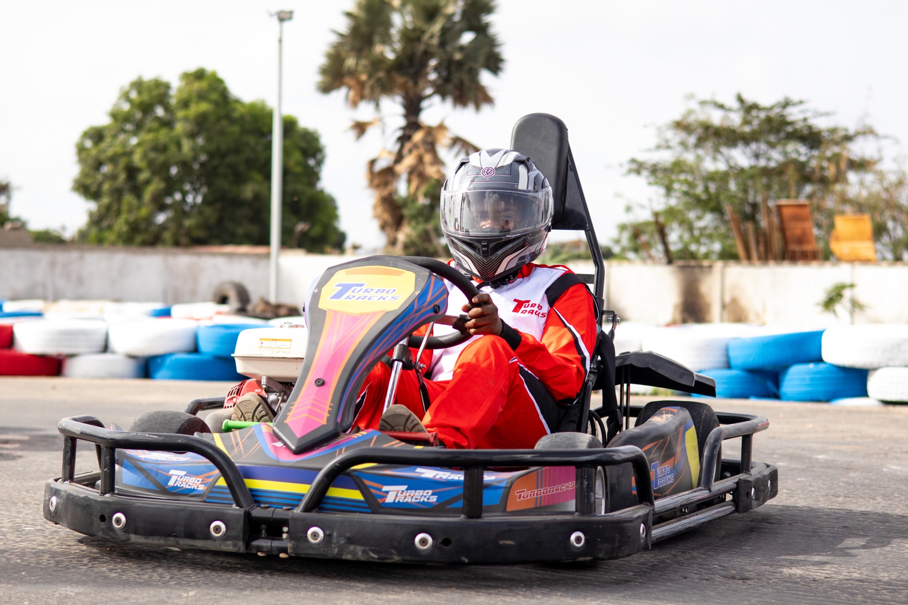 Driver at the wheel of a Turbo Tracks kart